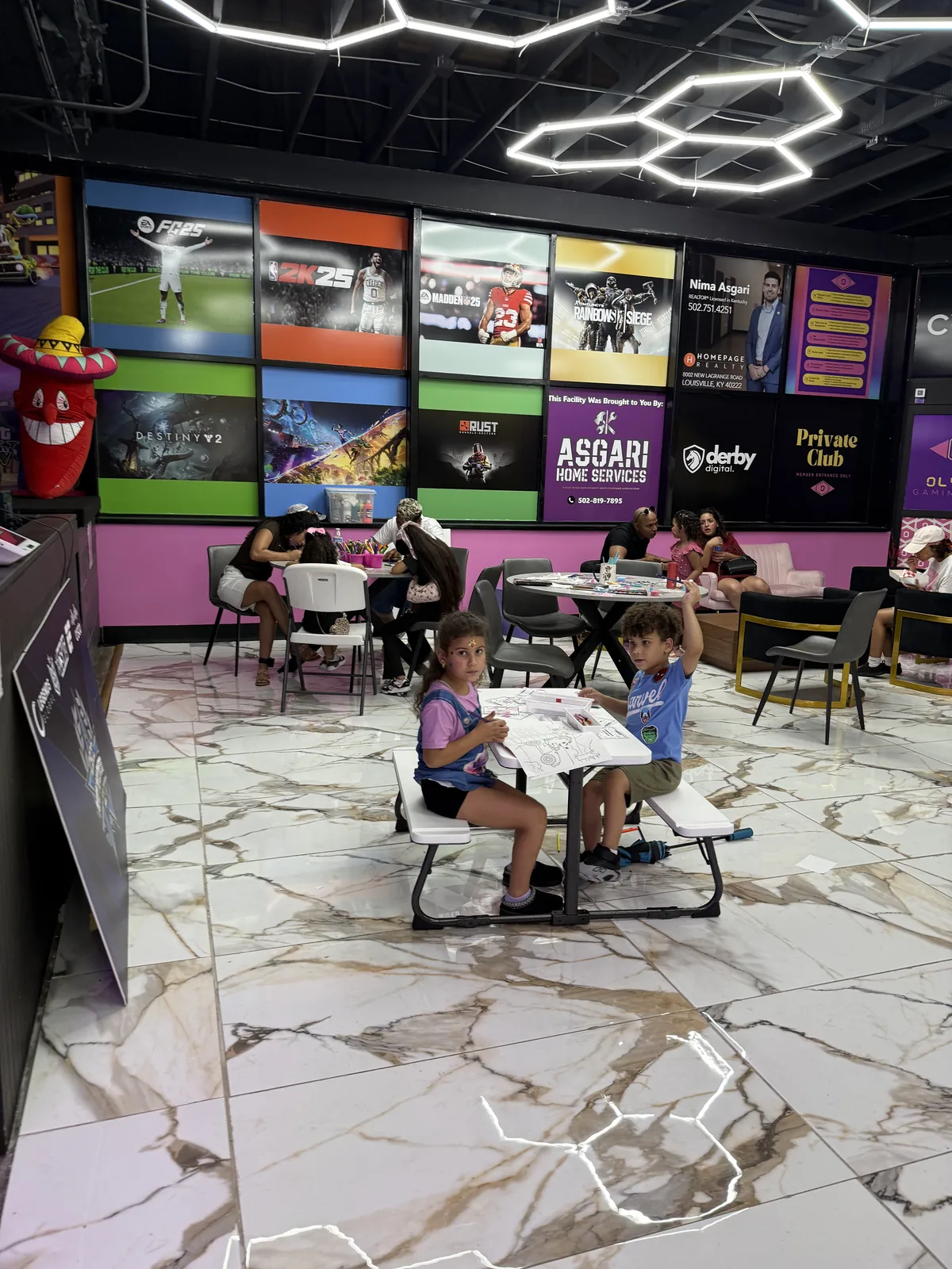 Kids at a table on the Olympus floor